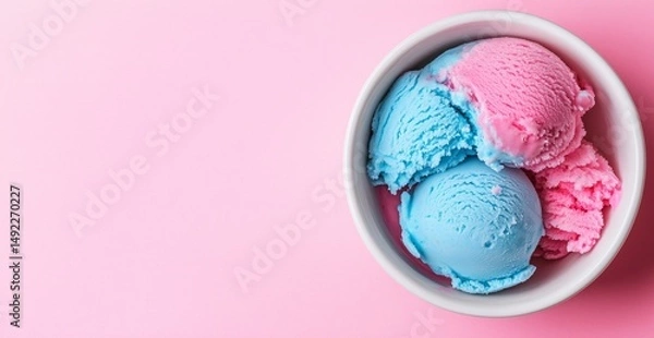 Fototapeta Pink and blue ice cream scoops with colorful sprinkles in white ceramic bowl on pink background. Summer dessert and sweet treat concept. Image for confectionery menu. Banner with copy space