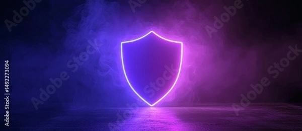 Fototapeta A technology symbol in the form of a pink and blue neon light shield icon is depicted in 3D, standing out against its black background