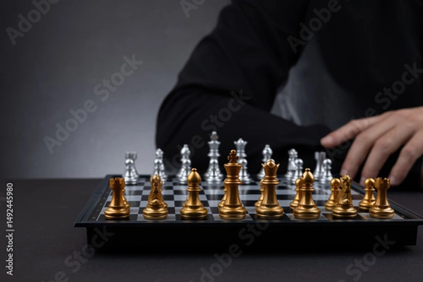 Fototapeta selective focus of chessboard player on blurred background