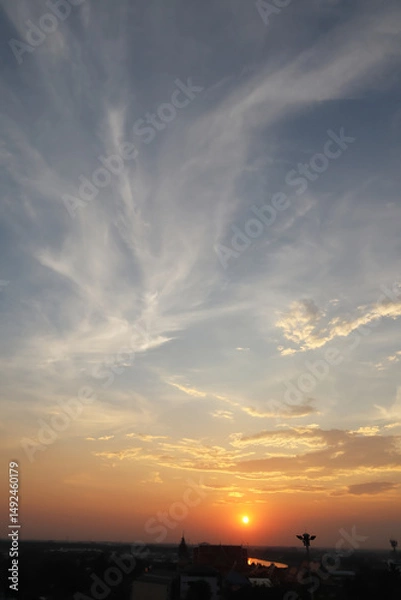 Fototapeta Aerial view of sunrise in suburb area with freshness atmosphere on tropical summer season beautiful clear sky.Image use for travel and meteorology forecast background.
