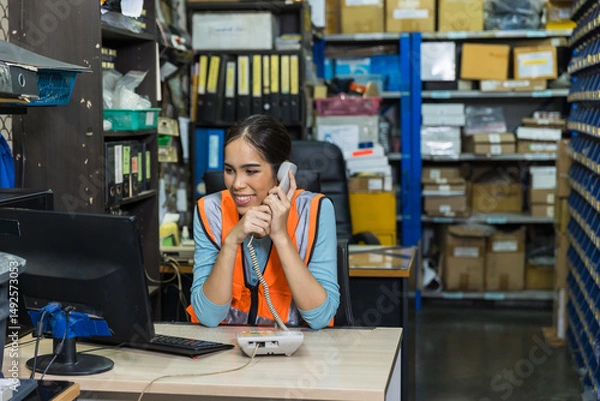 Fototapeta products stock inventory engineer sale agent in hardware shop phone calling receiving order from customer or technical support oncall.