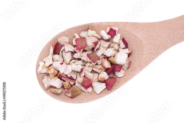 Fototapeta Dehydrated apple flakes in wooden spoon
