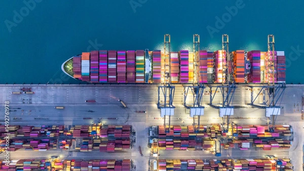 Fototapeta Aerial view cargo container ship global business maritime logistic, Cargo container ship freight shipping international supply chain, Sea freight industrial import export logistic transport industry.