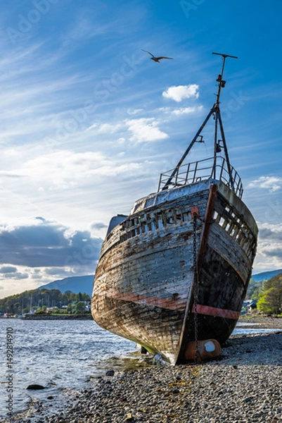 Fototapeta View of Corpach Wreck or Old Boat of Caol and Nevis Range Mountains, Caol Beach, Corpach, Fort William, Highland, Scotland, UK