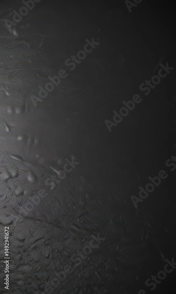 Fototapeta Sleek black leather, smooth surface, subtle texture,  high-resolution,  background