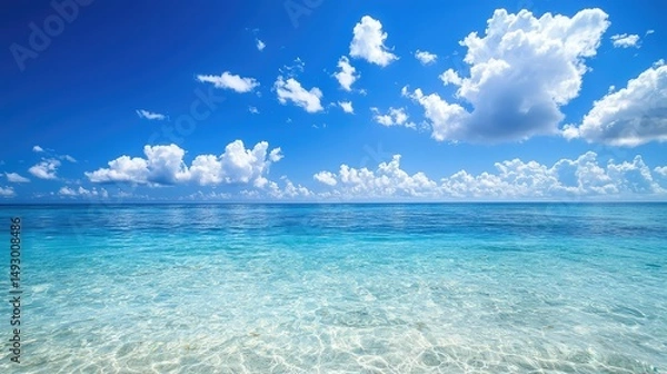 Obraz stunning view of the endless blue sky above and the crystal-clear ocean water below, offering the perfect peaceful retreat for relaxation on vacation.