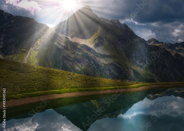 Fototapeta View on a lake and mountains above Defereggental valley on a summer day