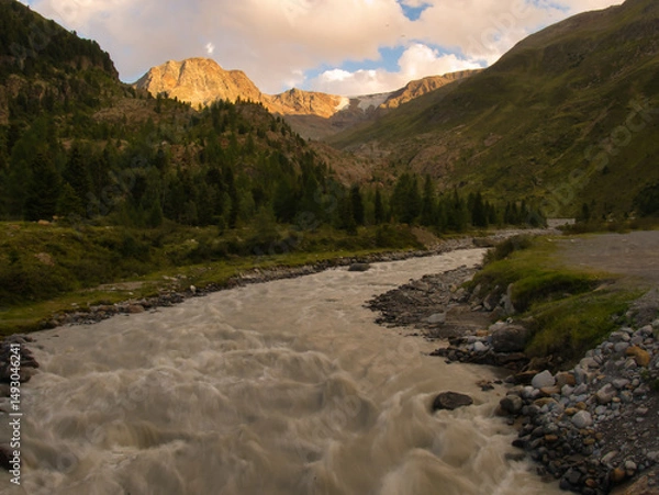 Fototapeta Brook in Kaunertal valley on a summer evening