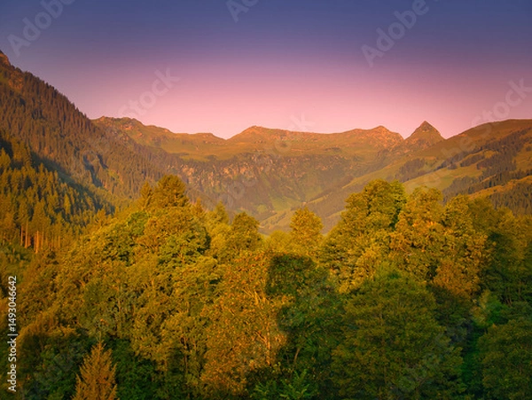 Fototapeta Sunrise in a mountains near Saalbach Hinterglemm Leogang ski resort during summer morning