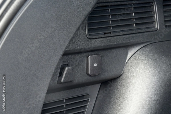 Fototapeta 12 Volts power outlet socket in the car
