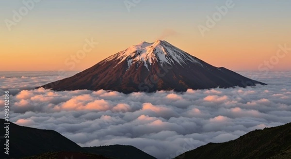 Obraz Mountain Peak Above Clouds at Sunset