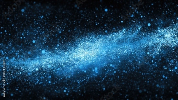 Fototapeta Abstract blue particles on a dark background create a dynamic effect