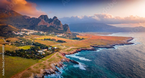 Obraz Panoramic evening view from flying drone of Sicily, Isolidda Beach, San Vito cape, Italy, Europe. Fantastic summer sunset on Mediterranean sea.Traveling concept background..