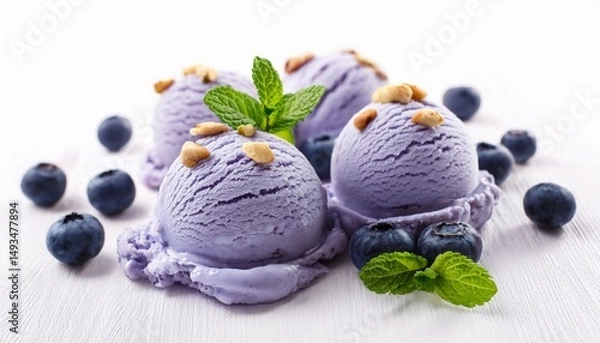 Obraz blueberry ice cream scoops with nuts and mint on white background