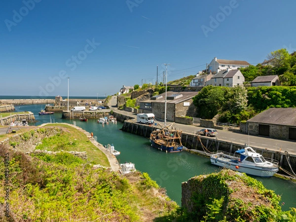 Fototapeta Amlwch Anglesey. A small fishing harbour with many boats docked in it