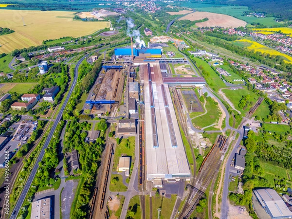 Fototapeta Stahlwerk Thüringen GmbH (SWT) is a company based in Unterwellenborn that dates back to the Maxhütte founded in the 19th century.