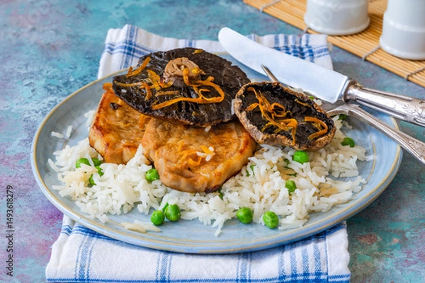 Obraz Orange glazed pork escalopes and portobello mushrooms with rice