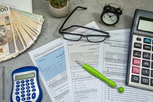 Fototapeta PIT-38 PIT 37 empty form, annual tax return to the tax office, zloty money calculator pen glasses