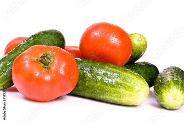 Fototapeta Cucumbers and tomato, isolated on white background