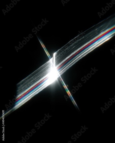 Fototapeta Light Splitting Through Prism Creates Rainbow Spectrum on Black Background Close Up Abstract Shot