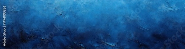 Fototapeta Abstract textured blue painting with dark and light shades creating a dynamic and moody atmosphere