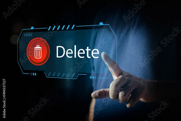 Obraz Man pushing the delete button on virtual screen. The concept of deletion or erase contacts, Deleting files from the system. Spam mail, electronic messages or personal data in computer systems.