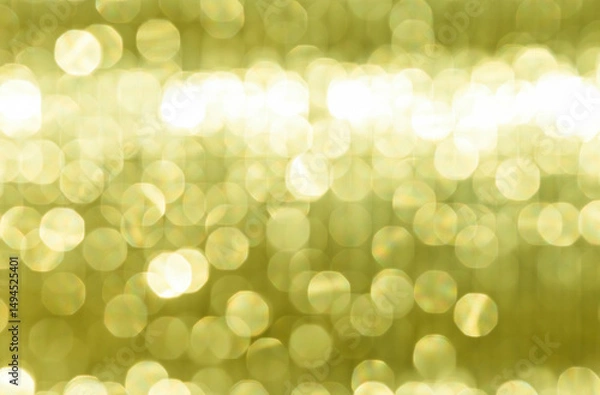 Fototapeta Abstract blurred yellow light bokeh background, festive season concept background, yellow bokeh pattern background