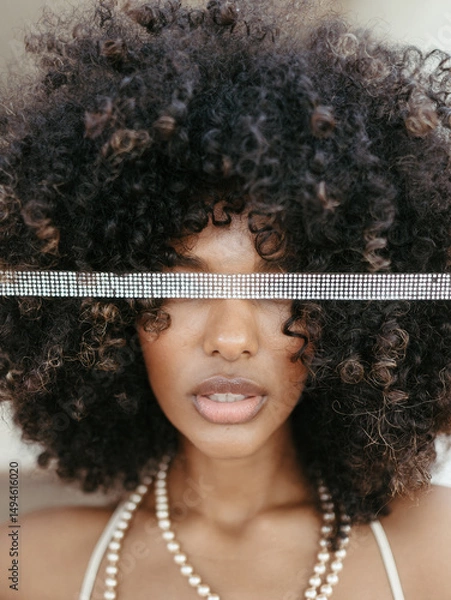 Fototapeta Afro Style Portrait of a Confident Fashionista Laughing with Glamour and Attitude. Smiling.