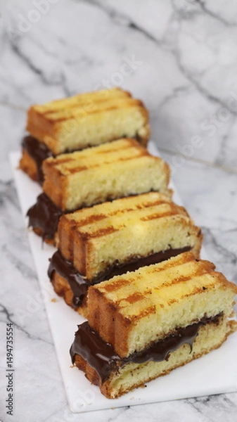 Fototapeta baked sponge cake in photos with various camera angles 45 degrees, flat lay and front view. close up and full shot