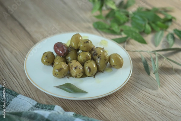 Obraz Marinated olives on the table