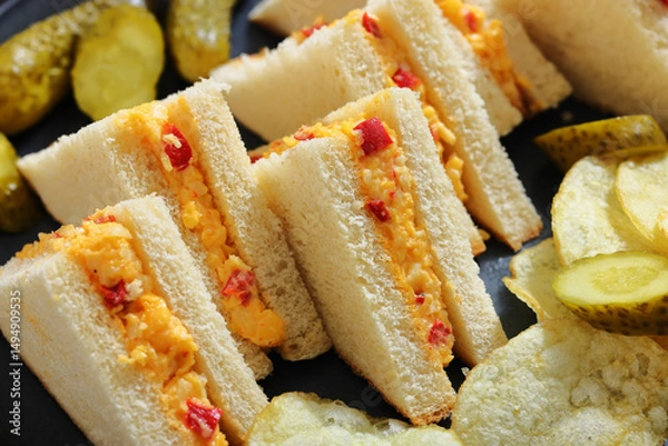 Obraz pimento cheese sandwiches with pickles and chips