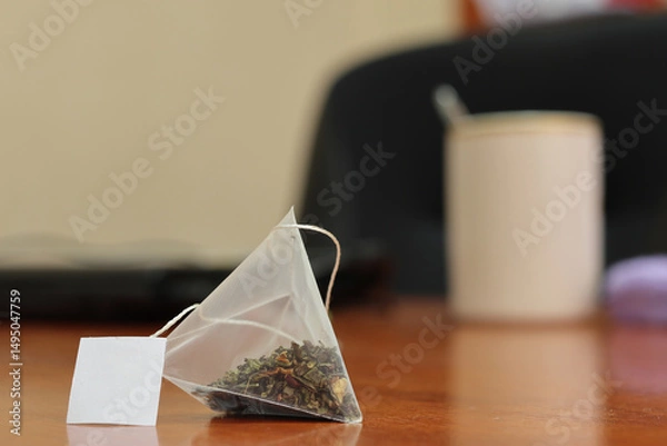 Obraz Green tea bag on a table.