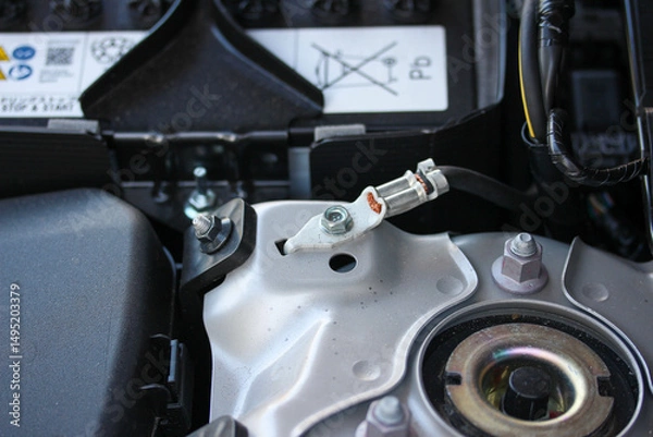 Fototapeta Ground wire connection in the engine bay of a new car