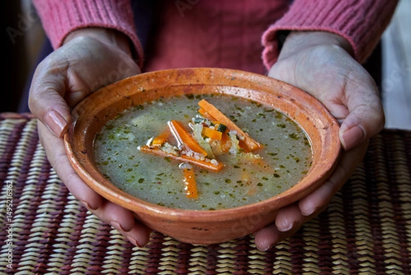 Fototapeta A comforting bowl of Cusco-style quinoa soup — rich in Andean tradition, full of flavor, and packed with wholesome ingredients. A warm taste of the Peruvian highlands in every spoonful.
