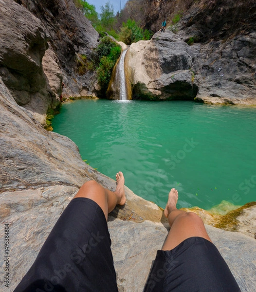 Obraz Tourist resting near waterfall in puebla, mexico