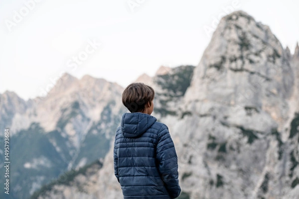 Obraz Boy looking at mountain view