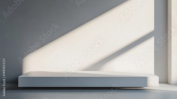 Fototapeta A white pedestal with a shadow on it