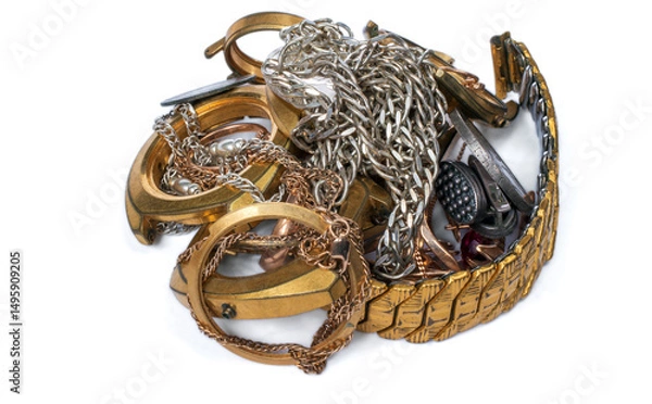 Obraz A scrap of gold. Old and broken jewelry, coins, watches of silver and gold and gold-plated on a white background.