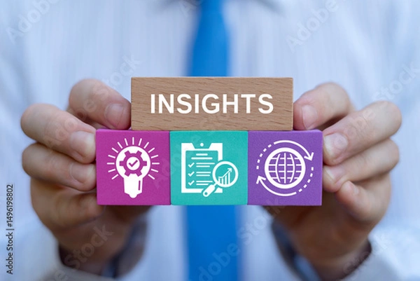Fototapeta Data Insight. Business person holding color blocks sees text: INSIGHTS. Insights Business Concept.