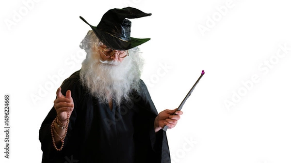 Fototapeta Wizard old man casting spell with magic wand