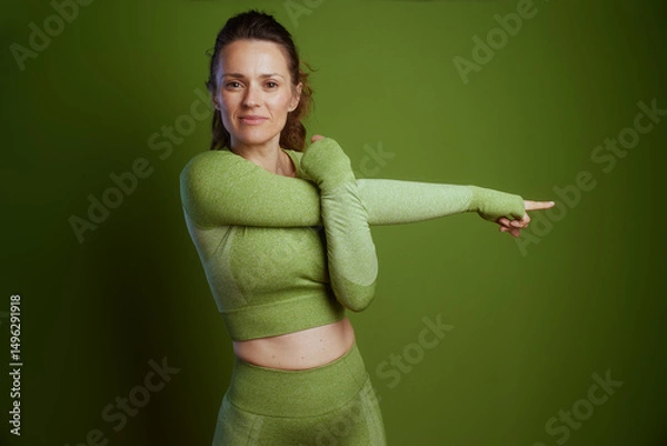 Obraz Focused Fitness: Middle-Aged Woman Stretching