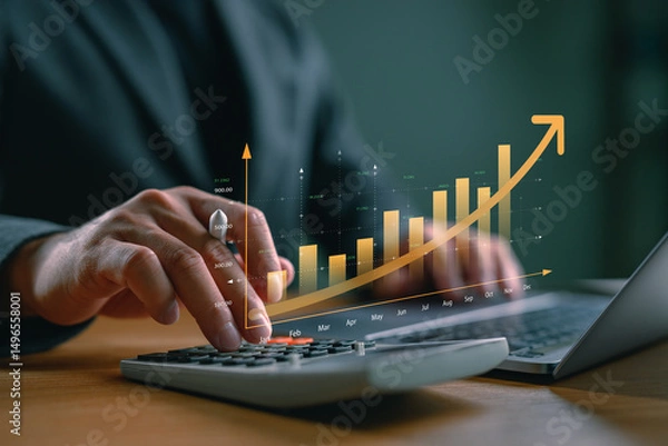 Fototapeta Financial growth and accounting analysis concept with businessman using calculator and virtual bar chart. Perfect for business success, revenue growth, finance report, and investment planning.
