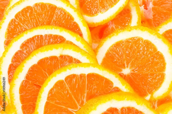 Fototapeta Many sliced oranges