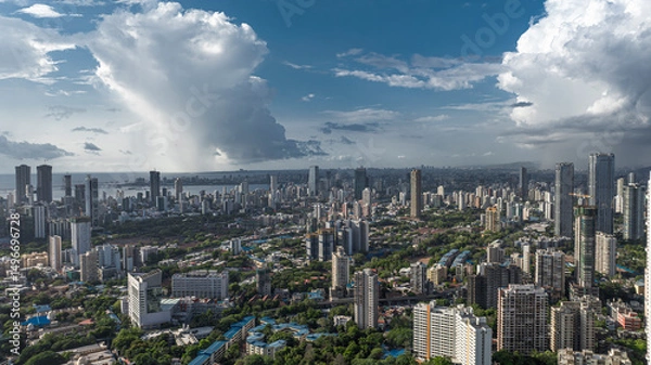 Fototapeta Modern City high-rise skyscraper buildings. Aerial drone view of the Financial District in Mumbai. Beautiful Cloudy weather during monsoon in Mumbai, India. Dadar-Bandra view.