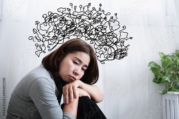 Obraz depressed asian woman suffering from anxiety, depression, and overthinking, filled with negative thoughts in mind, signs of mental health issues