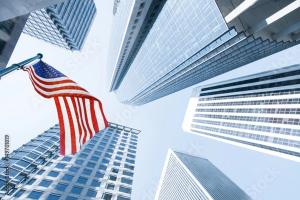 Obraz View of American flag on blue building background