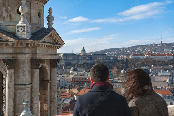 Obraz Couple admiring Budapest cityscape from st. Stephen's basilica viewpoint. Hungary