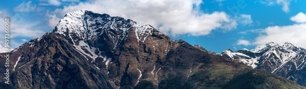 Fototapeta Majestic panorama of Monte Legnone, the highest peak of the Orobie Alps' western ridge, showcasing its rugged slopes and commanding presence over Lake Como region, Lombardy, Italy