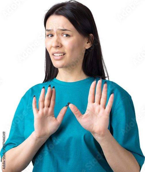 Fototapeta Portrait of uncomfortable pretty brunette, raising palms in stop gesture. That is enough, thanks.