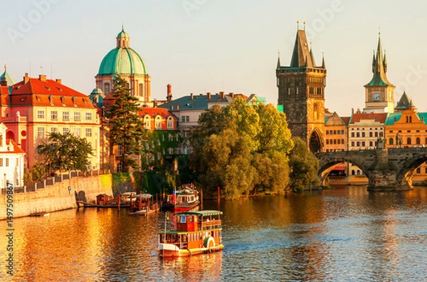 Obraz Charles Bridge and architecture of the Old Town in Prague, Czech republic. Pleasure ship on the Vltava river in Prague. Charles Bridge is the main attraction of Prague in Czech republic.